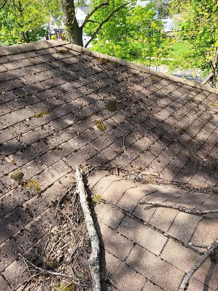 A shingled roof with water leaks, hail damage roof repair, and damaged by hail in Ohio.