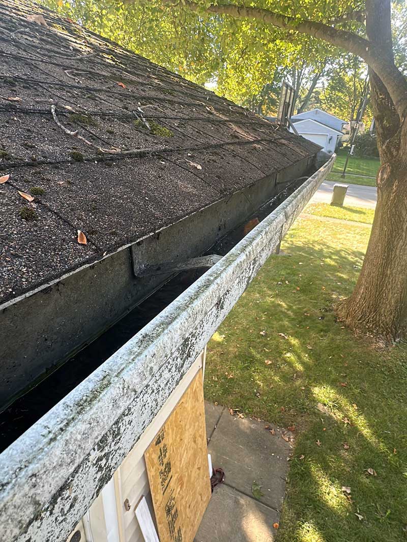 A house undergoing roof repair work.