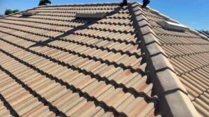The roof of a house with a tiled roof.